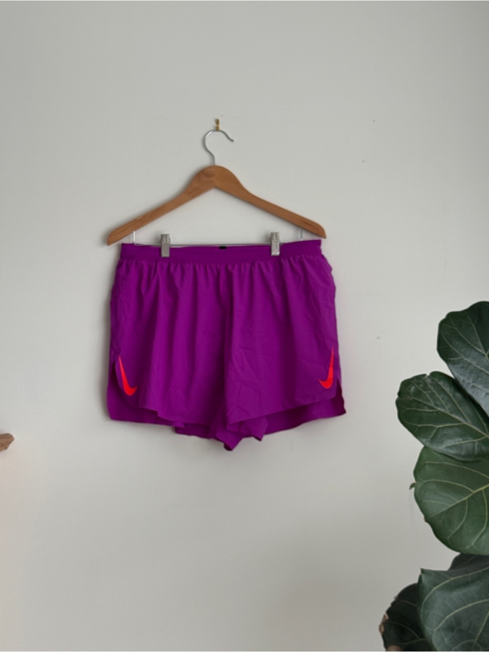 Nike AeroSwift Women's Bright Purple Athletic Shorts with Orange Swoosh